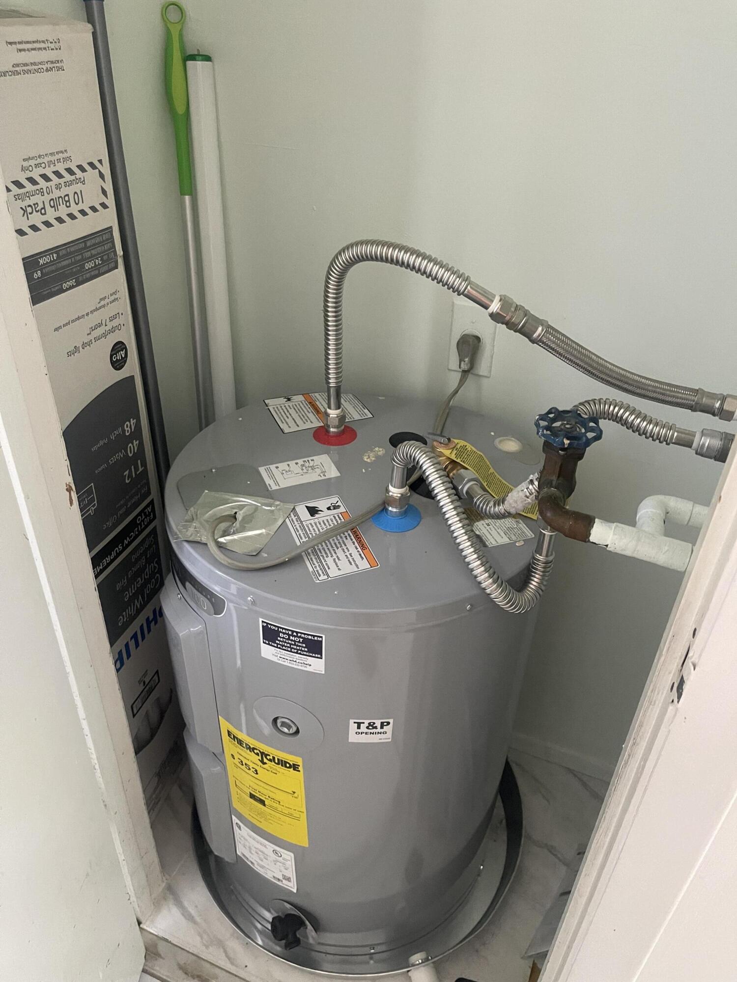 1081 Southeast Monterey Road, Unit 331 Stuart, FL 34994 - Photo 10 of 12 a bathroom with a sink mirror vanity and toilet