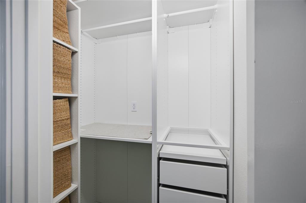 2013 Sunset Wind Loop Oldsmar, FL 34677 - Photo 18 of 43 a view of walk in closet with empty racks