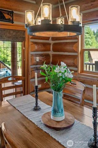 a vase of flowers sitting on a table