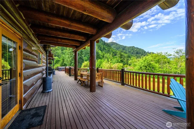 a view of porch with wooden floor