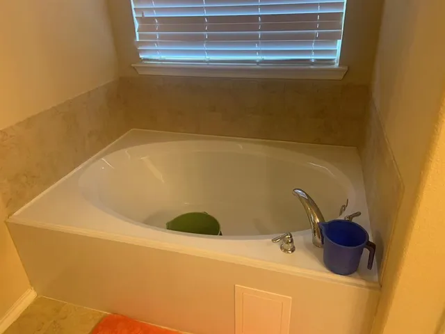 a bathroom with a tub