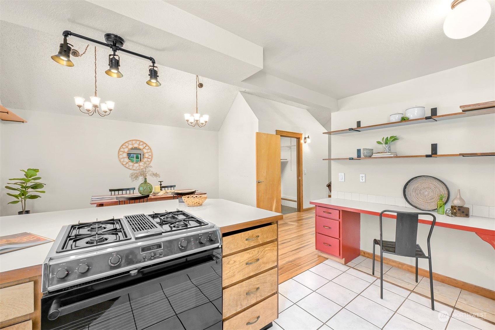 1506 Willowbrook Place Bellingham, WA 98229 - Photo 17 of 37 a kitchen with stainless steel appliances granite countertop a stove a sink and a refrigerator
