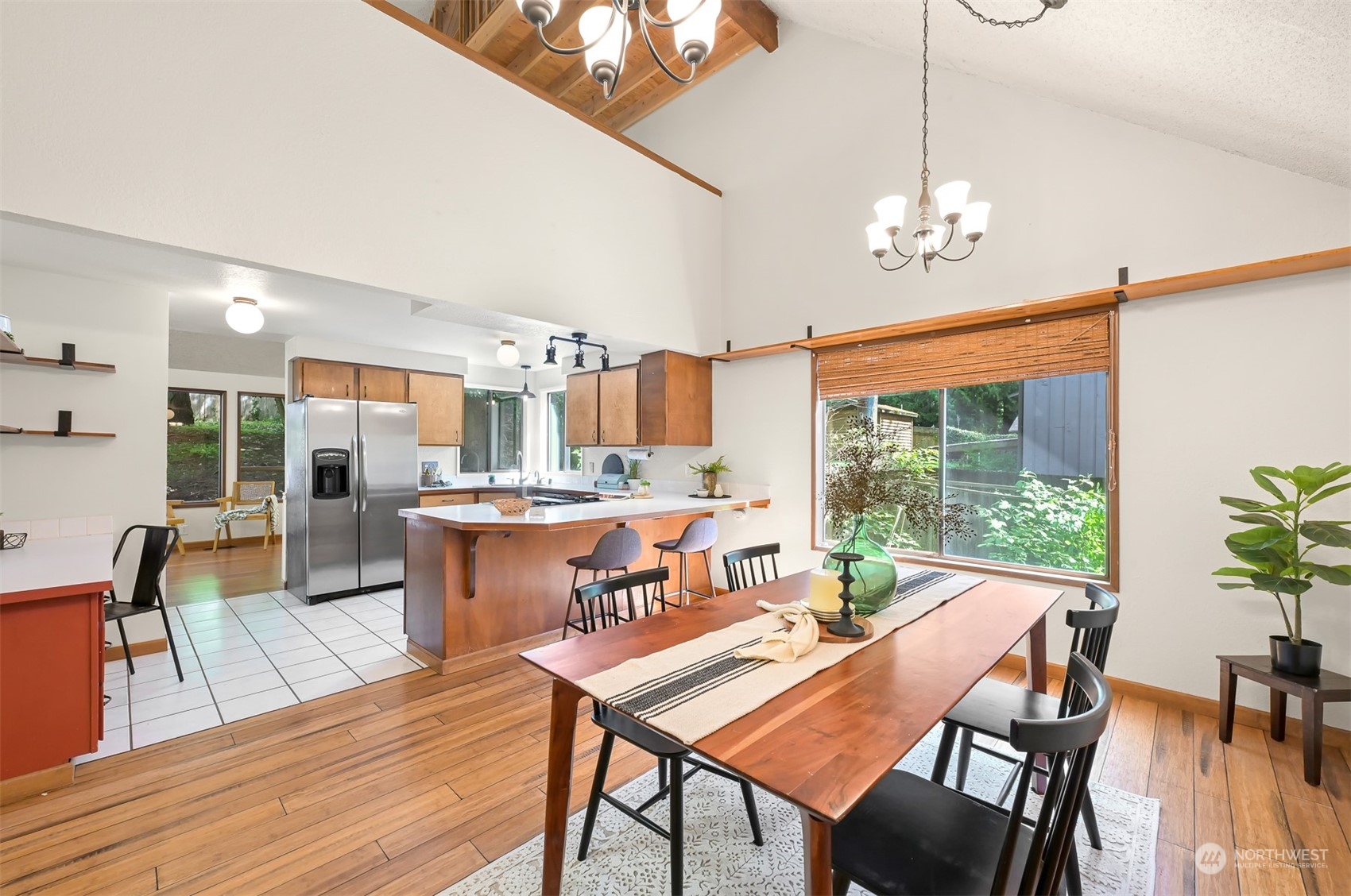 1506 Willowbrook Place Bellingham, WA 98229 - Photo 19 of 37 a view of a dining room with furniture window and wooden floor