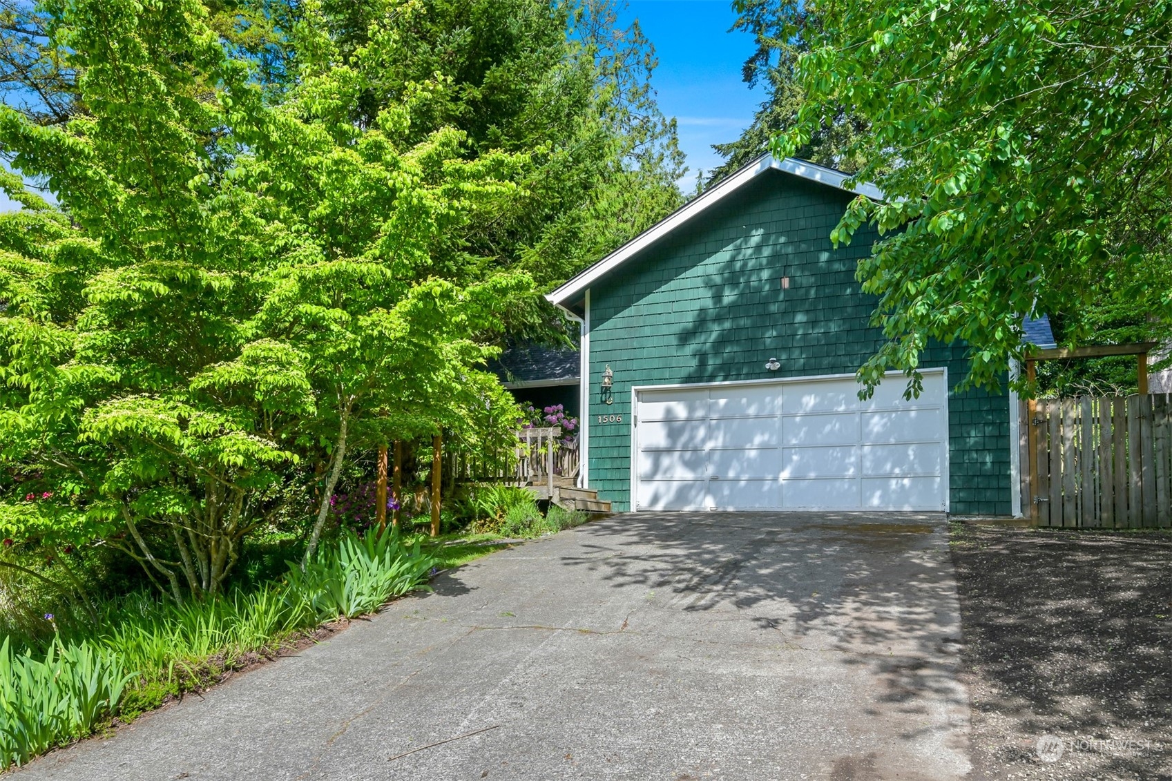 1506 Willowbrook Place Bellingham, WA 98229 - Photo 3 of 37 a view of a house with a tree and yard