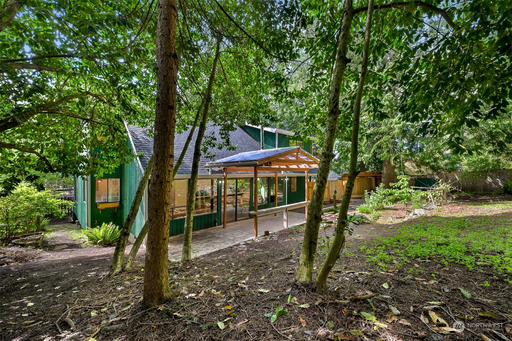 1506 Willowbrook Place Bellingham, WA 98229 - Photo 36 of 37 a view of a house with backyard and sitting area
