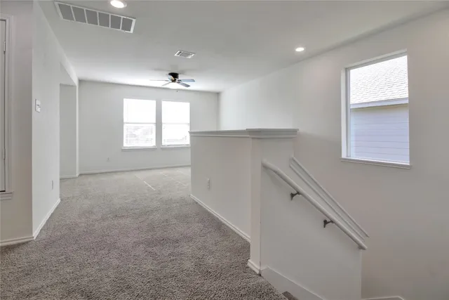 a bathroom with a sink toilet and vanity