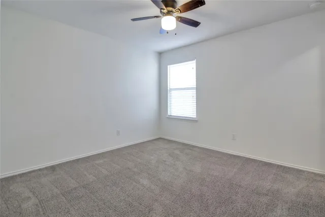 a bathroom with a bathtub and toilet