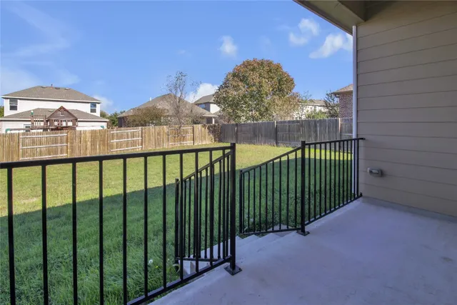 a view of a garden with a pathway