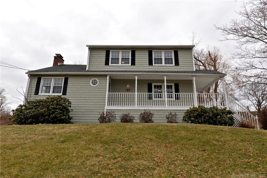 12 Drover Road Brookfield, CT 06804 - Photo 1 of 1 a front view of a house with garden