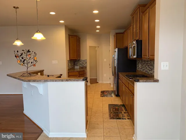 a view of a living room and dining room
