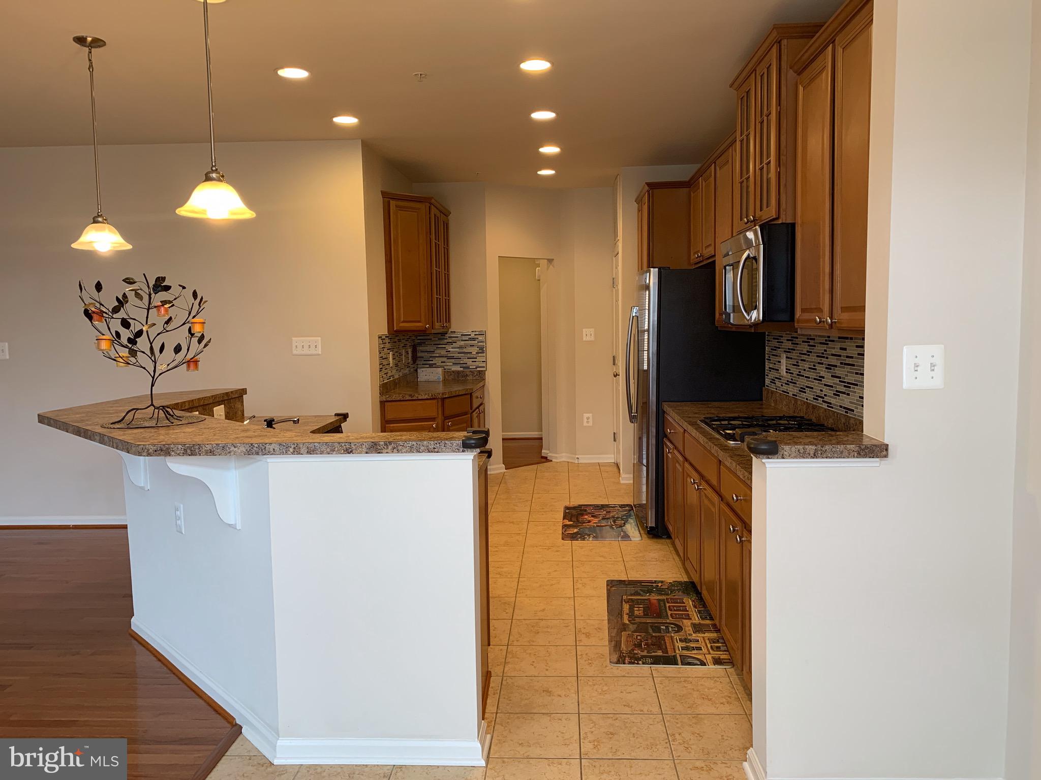 2816 Admiral Ridge Road Accokeek, MD 20607 - Photo 18 of 38 a view of a living room and dining room