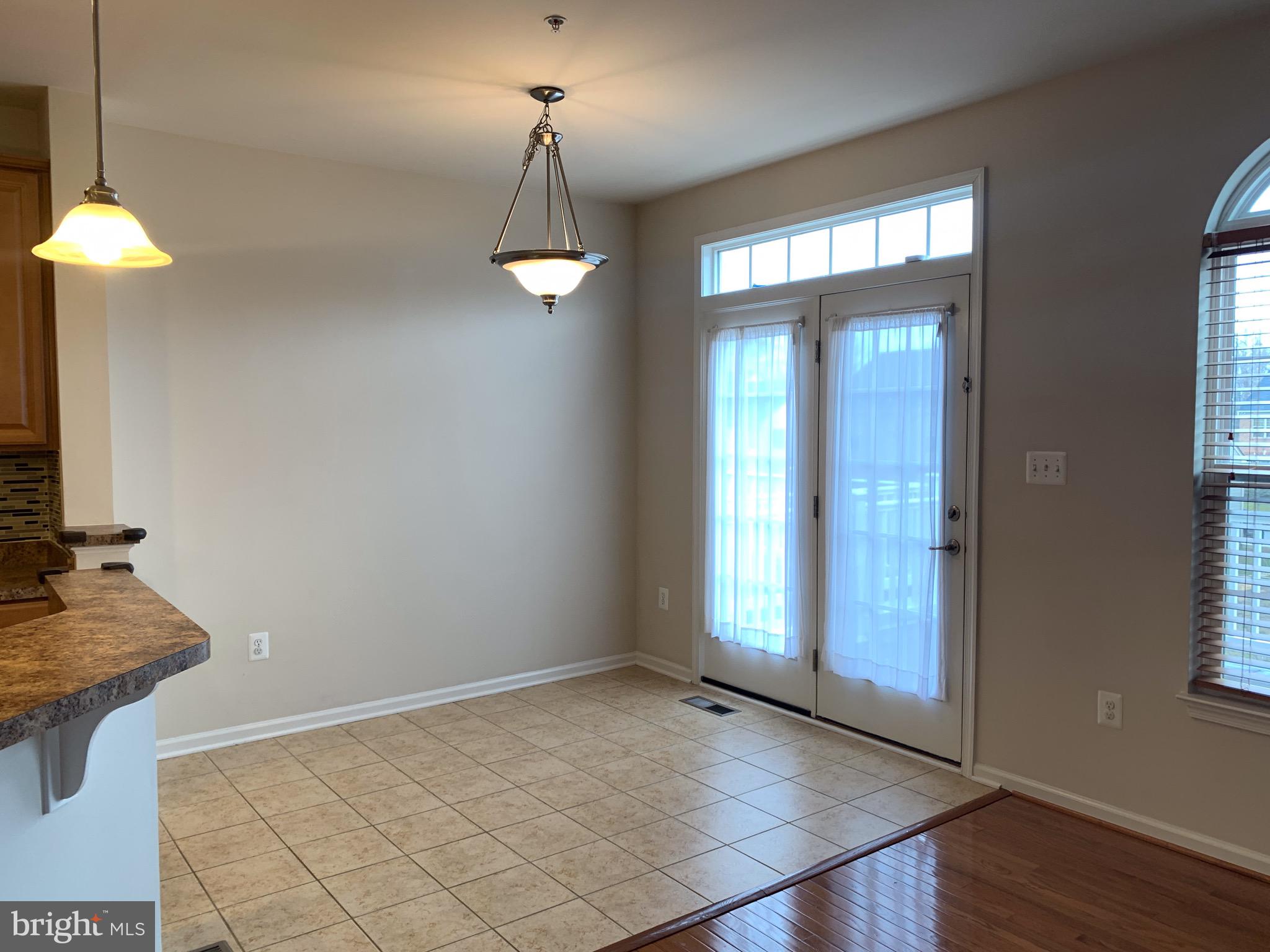 2816 Admiral Ridge Road Accokeek, MD 20607 - Photo 19 of 38 an empty room with windows