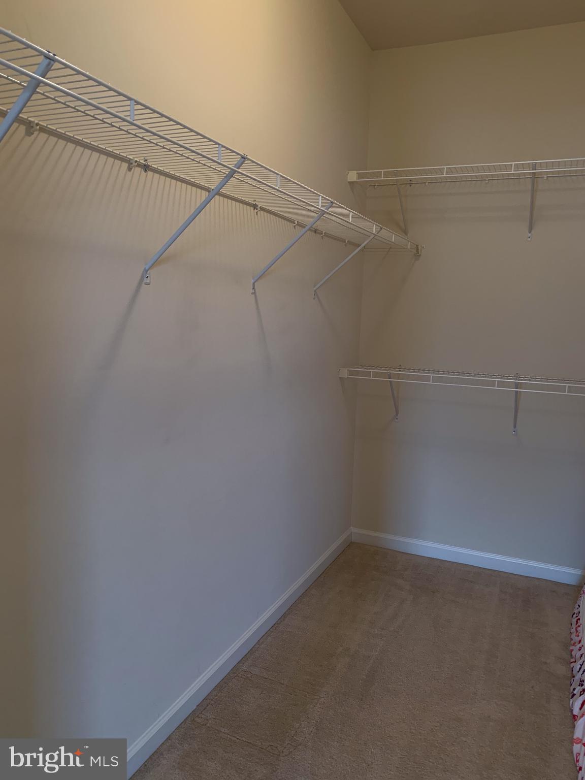 2816 Admiral Ridge Road Accokeek, MD 20607 - Photo 31 of 38 a view of a room with racks on the wall