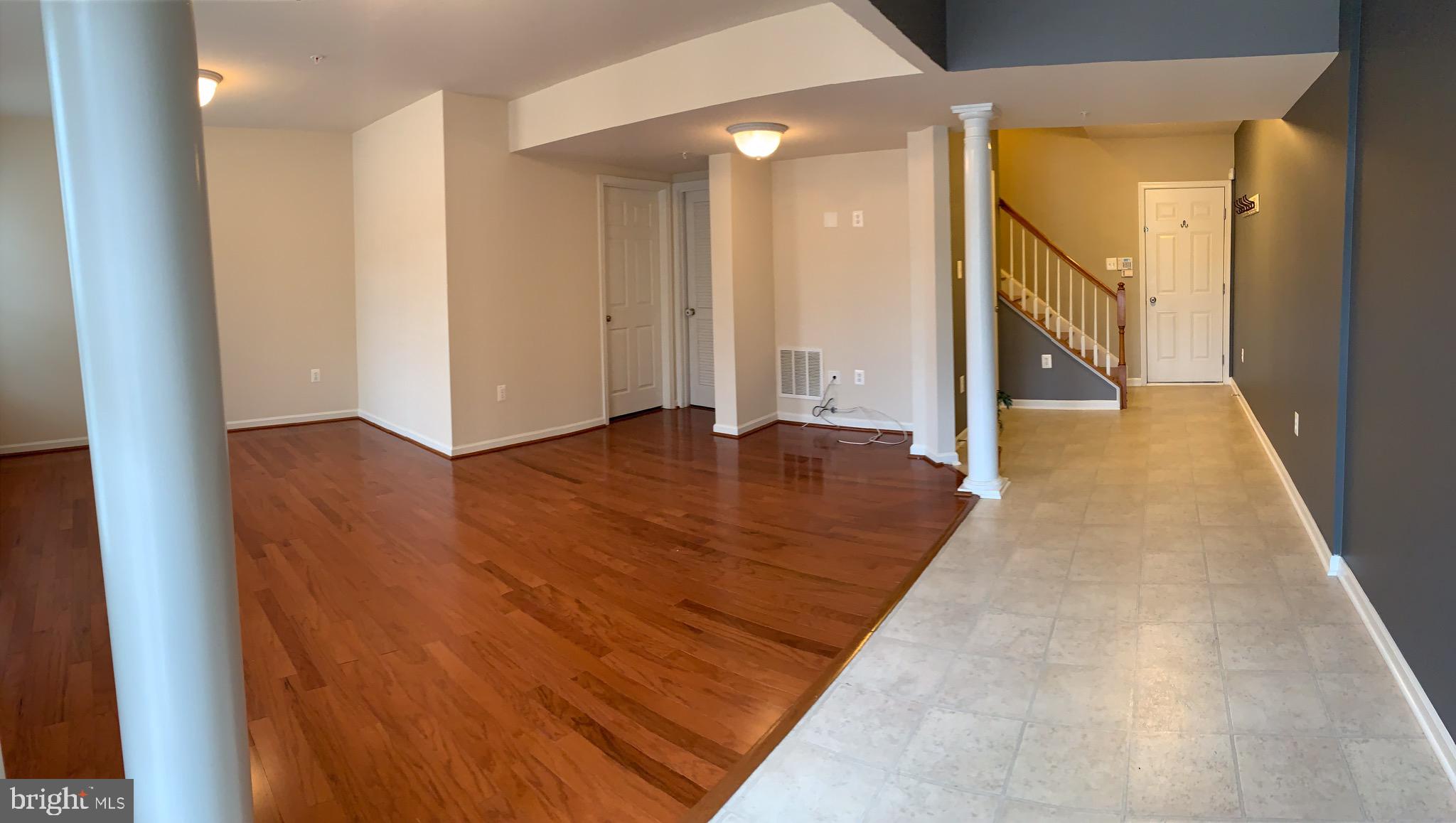 2816 Admiral Ridge Road Accokeek, MD 20607 - Photo 6 of 38 a view of an empty room with wooden floor
