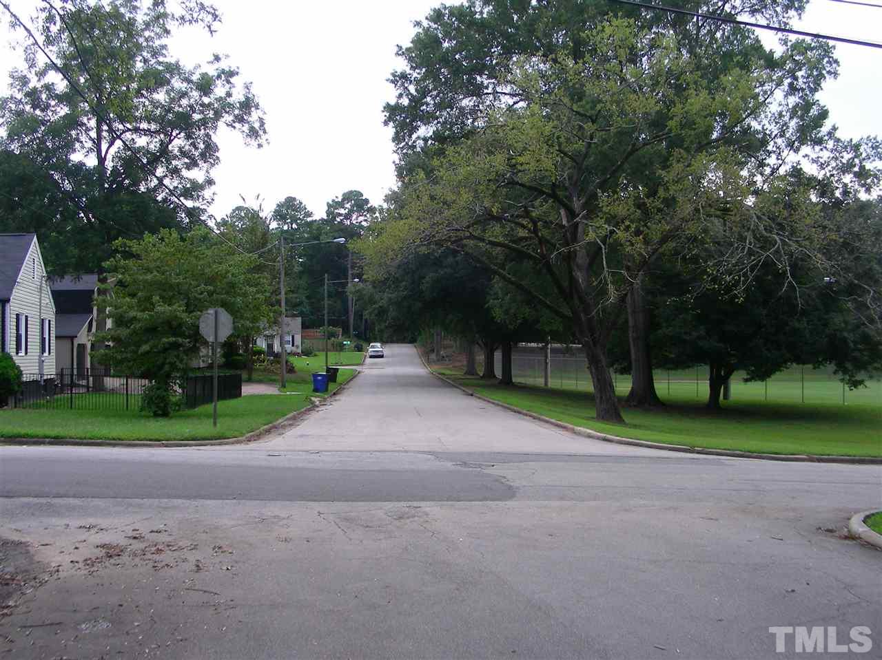 627 Monroe Drive Raleigh, NC 27604 - Photo 7 of 7 a view of road with large trees