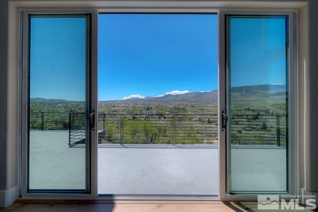 2372 Diamond J Place Reno, NV 89511 - Photo 20 of 25 a view of a balcony next to a yard
