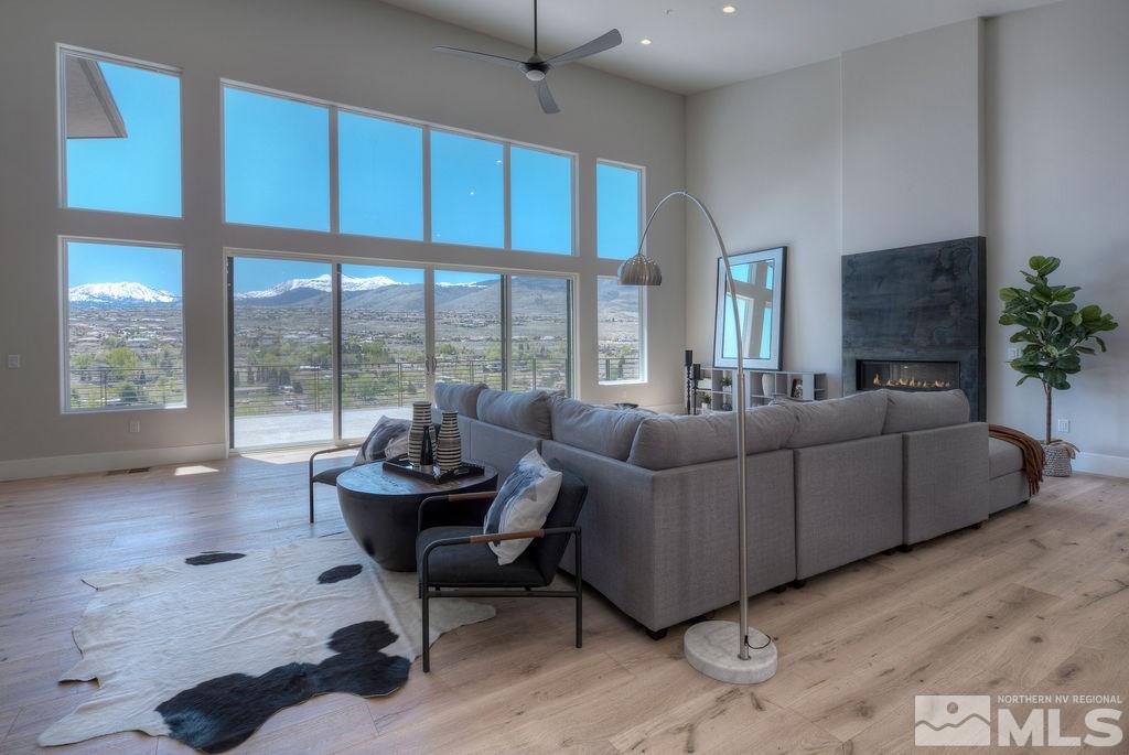 2372 Diamond J Place Reno, NV 89511 - Photo 4 of 25 a living room with furniture and a large window
