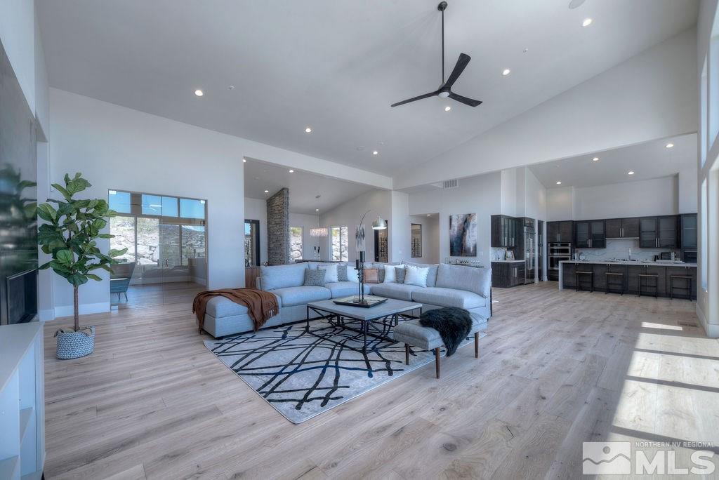 2372 Diamond J Place Reno, NV 89511 - Photo 5 of 25 a living room with furniture or kitchen view and a wooden floor