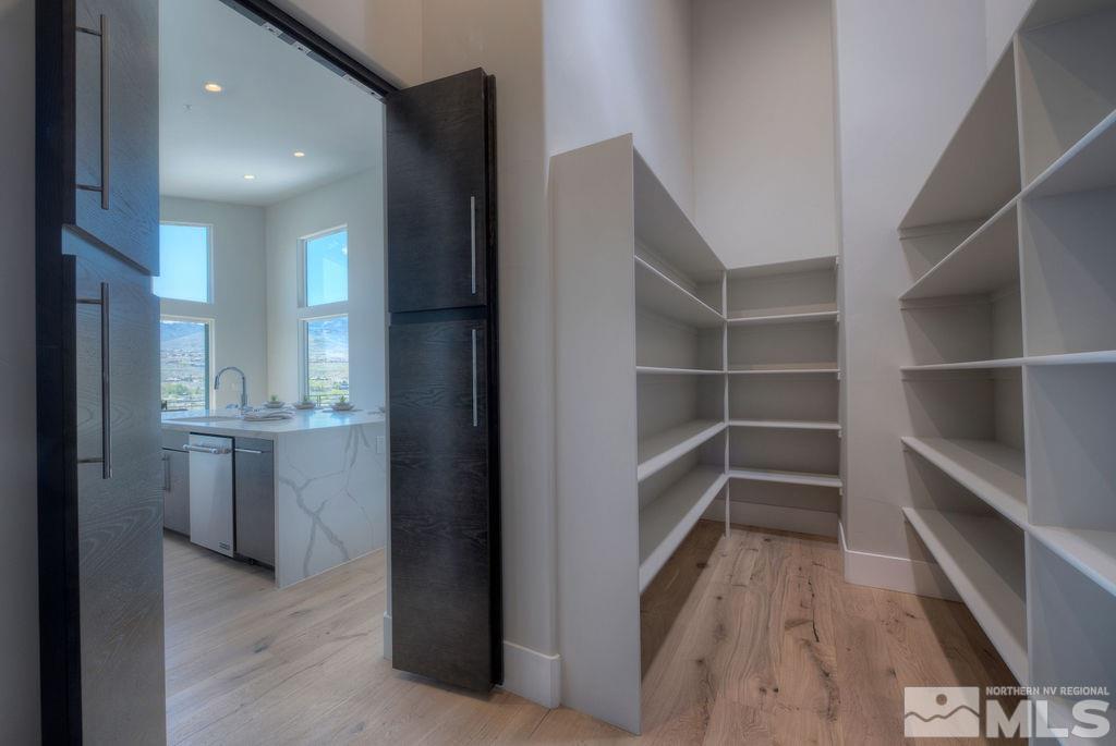 2372 Diamond J Place Reno, NV 89511 - Photo 10 of 25 a view of walk in closet with empty racks