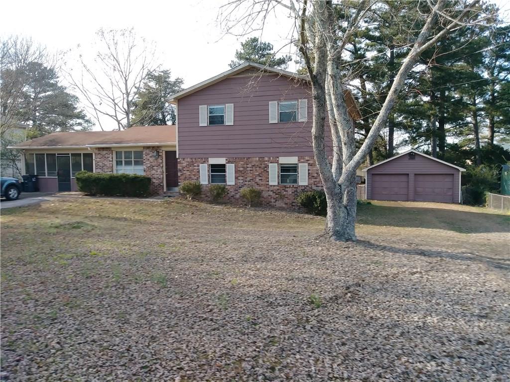 1965 North Road Snellville, GA 30078 - Photo 1 of 1 1965 North Road Split-Level Home and 2-Car Garage and Workshop-Storage view from Street