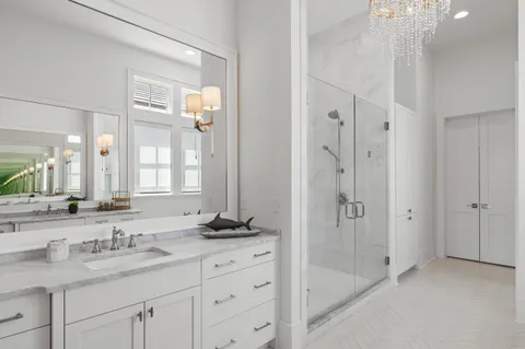 a bedroom with a large bed and a tv