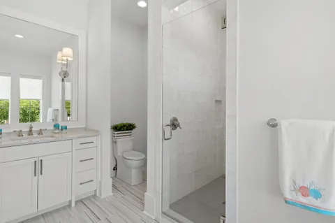 a view of a patio with a table and chairs