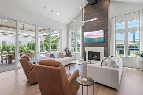 a kitchen with stainless steel appliances a stove a sink and cabinets