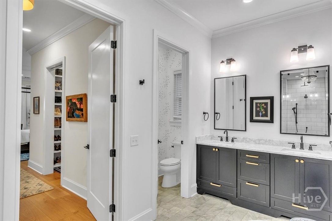 822 Dancy Avenue Savannah, GA 31419 - Photo 25 of 74 Primary suite bath features double vanity, water closet, separate tub and shower.