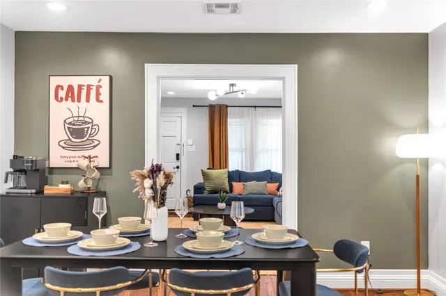 a view of a dining room with furniture