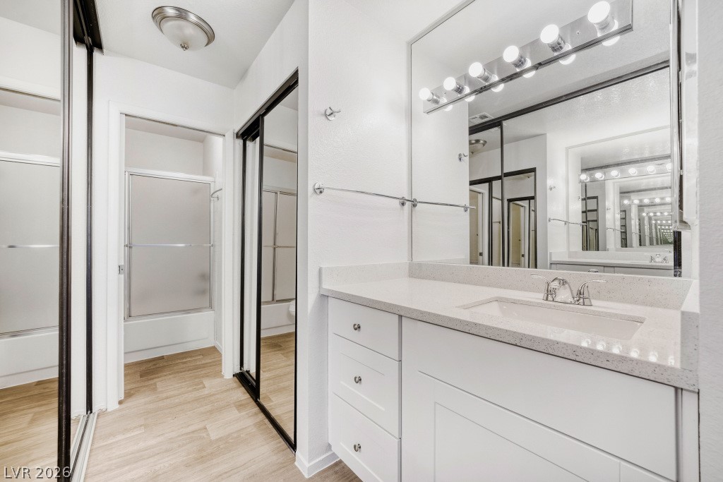 6250 West Flamingo Road, Unit 110 Las Vegas, NV 89103 - Photo 12 of 25 Primary bath-new vanity-2 closets