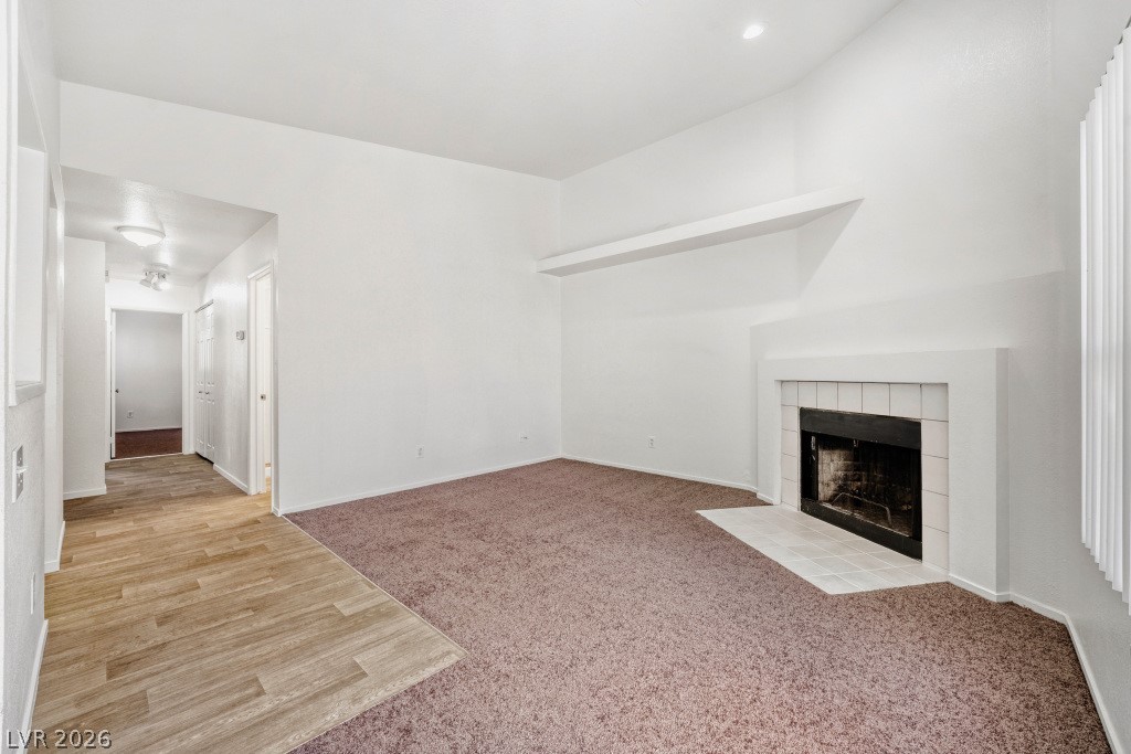 6250 West Flamingo Road, Unit 110 Las Vegas, NV 89103 - Photo 8 of 25 Living room with fireplace