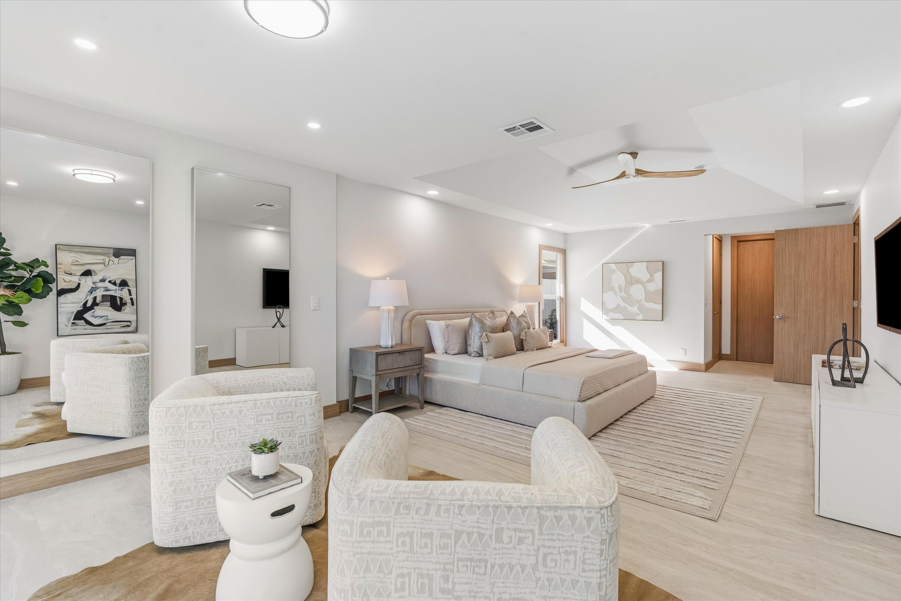 17036 Bay Street Jupiter, FL 33477 - Photo 30 of 68 a living room with furniture and a large window
