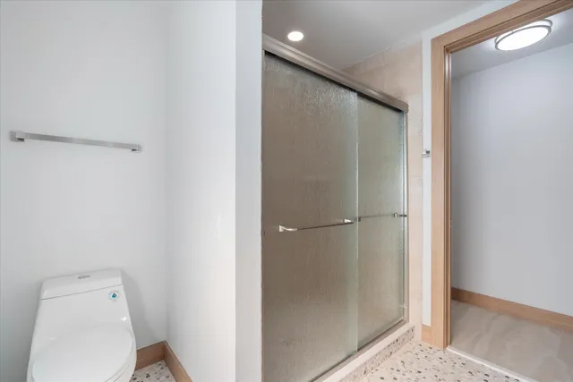 a view of a lake with a house in the background