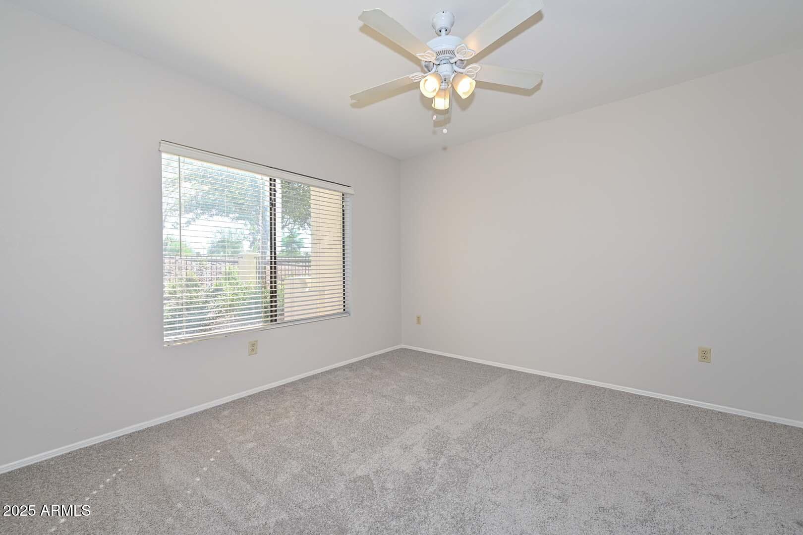 750 East Northern Avenue, Unit 1094 Phoenix, AZ 85020 - Photo 16 of 35 an empty room with a window