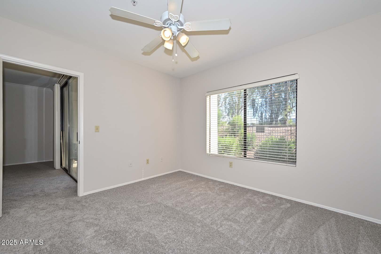 750 East Northern Avenue, Unit 1094 Phoenix, AZ 85020 - Photo 19 of 35 a view of an empty room with a window