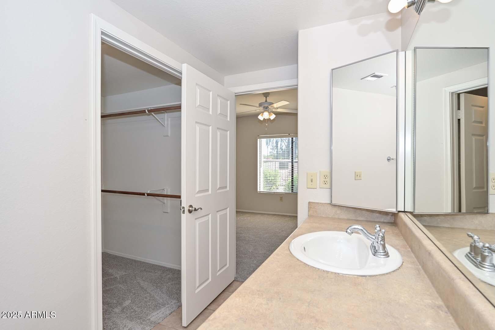 750 East Northern Avenue, Unit 1094 Phoenix, AZ 85020 - Photo 20 of 35 a bathroom with a sink and a mirror