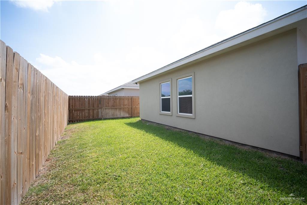 3086 Briggs Road, Unit B Weslaco, TX 78596 - Photo 14 of 15 View of fenced backyard