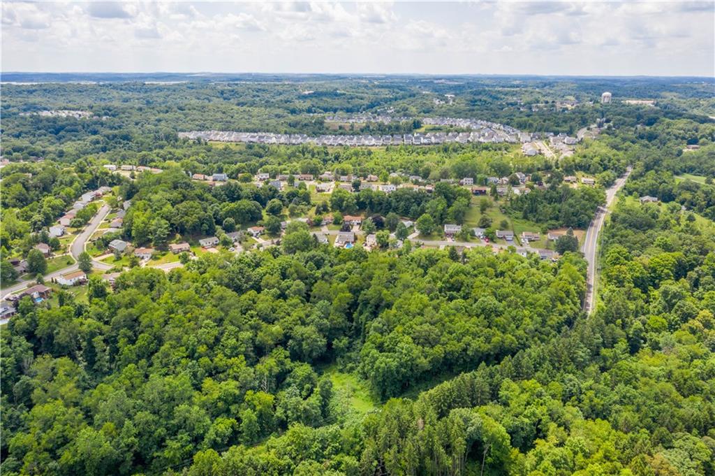 0 Spring Run Rd Extension Coraopolis, PA 15108 - Photo 7 of 8 an aerial view of residential houses with outdoor and green space
