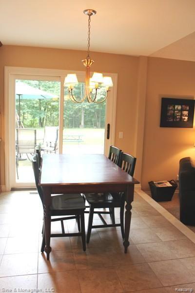 2965 Leyton Court Rochester, MI 48306 - Photo 12 of 29 Kitchen nook with porcelain floor, opens to fam rm