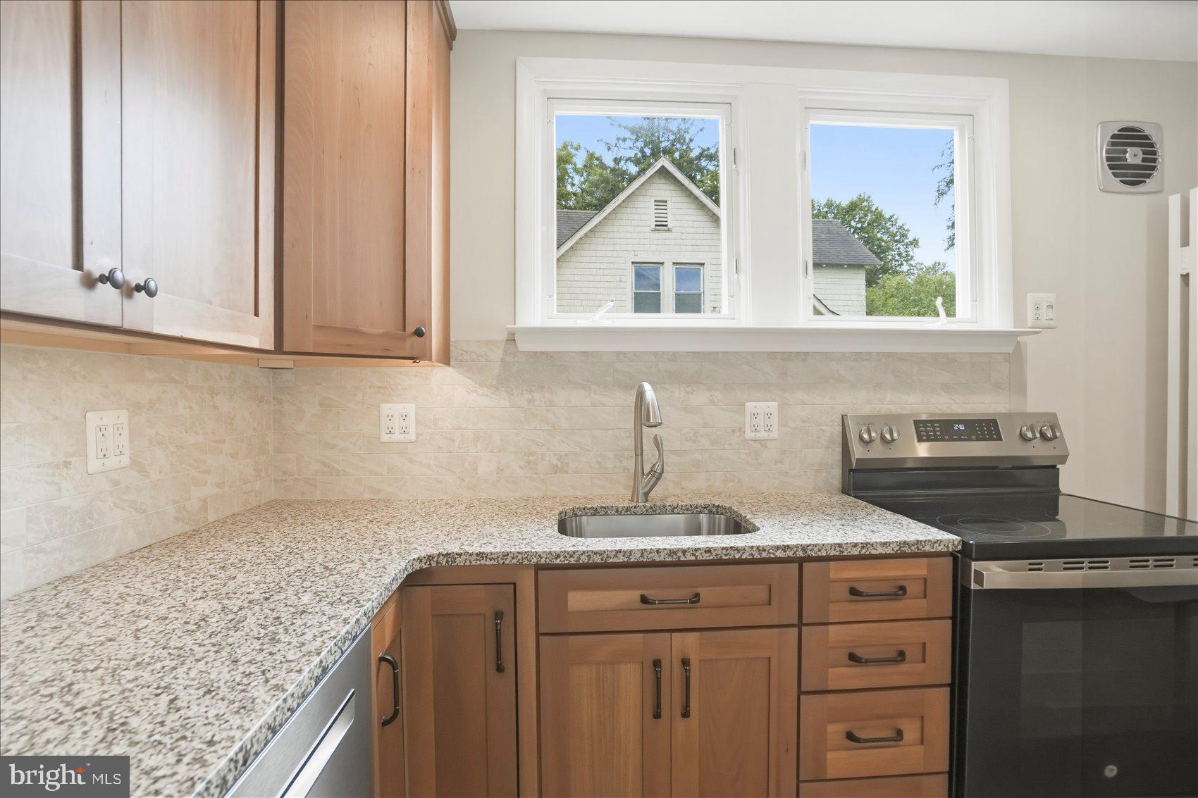 24 Normal Terrace Baltimore, MD 21286 - Photo 13 of 37 a kitchen with sink and cabinets