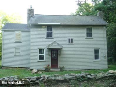 96 Fairview Road Monterey, MA 01245 - Photo 1 of 5 a front view of a house with a yard