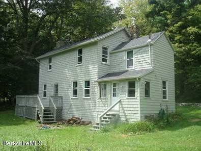 96 Fairview Road Monterey, MA 01245 - Photo 5 of 5 a view of a house with a yard