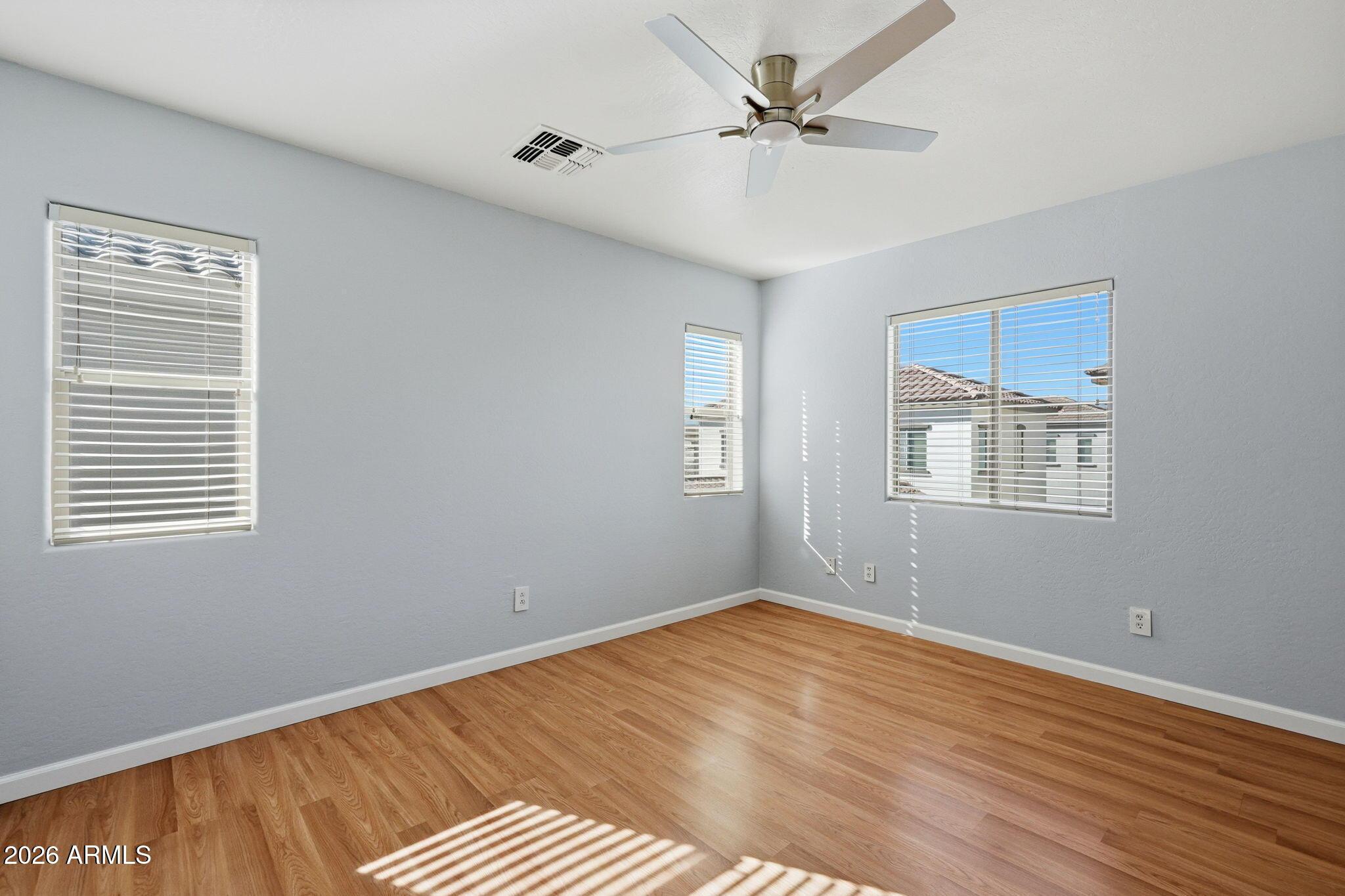 4678 East Redfield Road Gilbert, AZ 85234 - Photo 21 of 31 a view of an empty room with a window