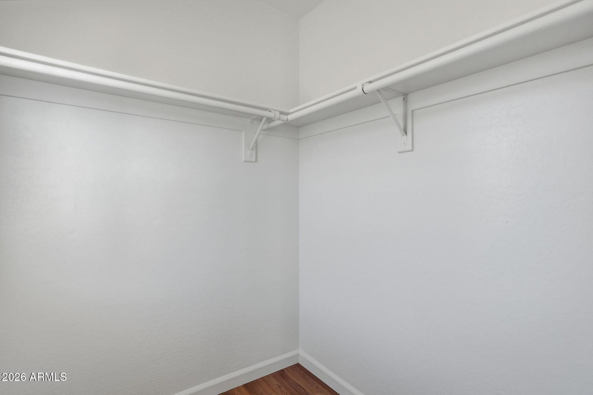 4678 East Redfield Road Gilbert, AZ 85234 - Photo 25 of 31 a view of a room with shelf on the wall