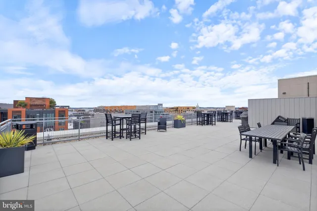 a view of parking garage with cars