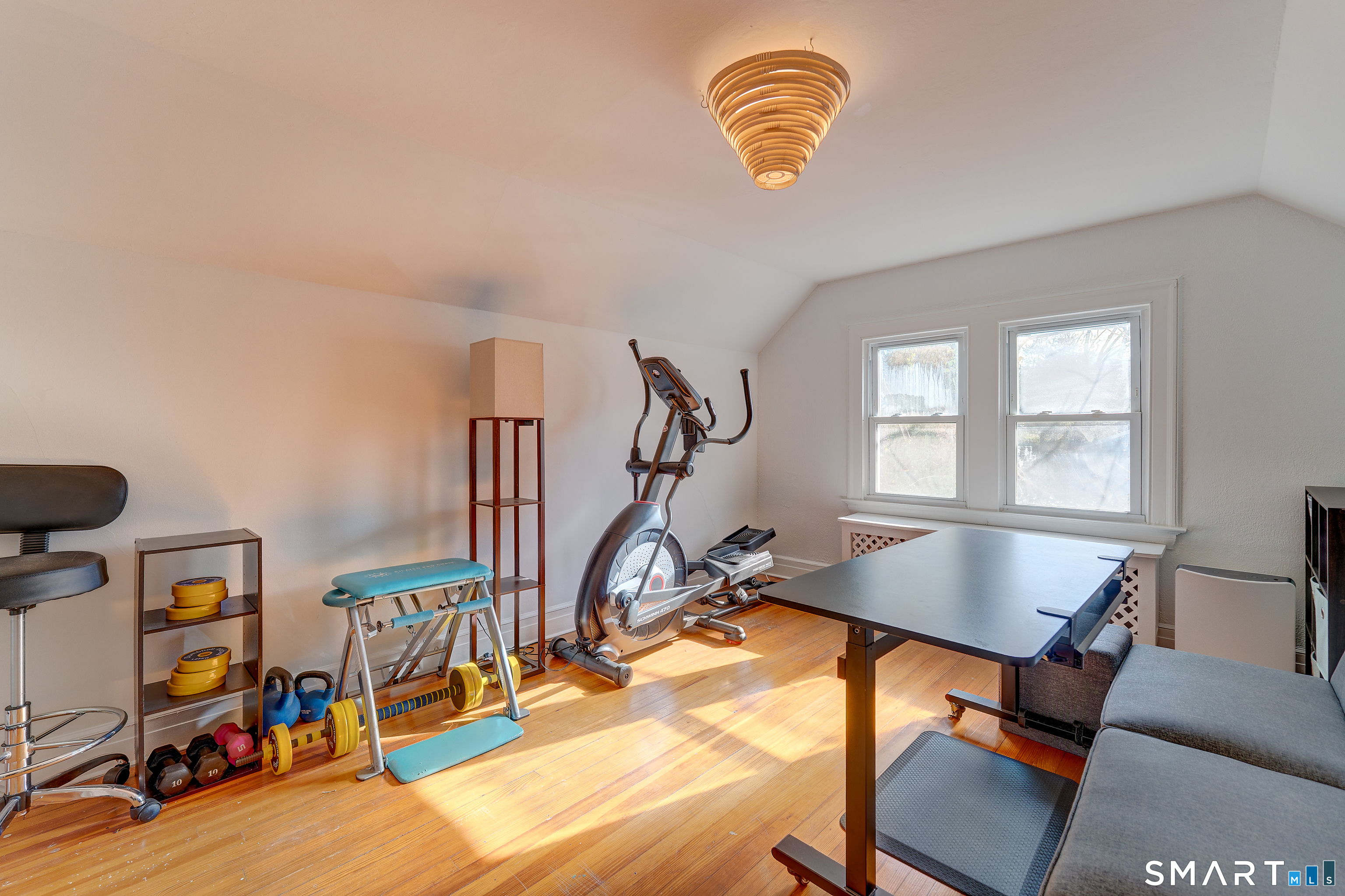 59 Morris Street Hamden, CT 06517 - Photo 10 of 15 a view of a room with gym equipment