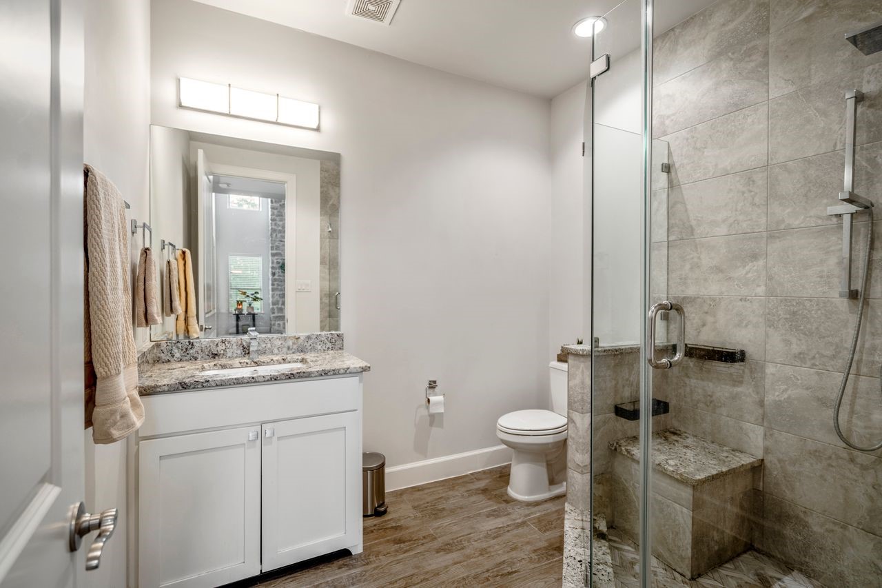 3202 Ozark Street Houston, TX 77021 - Photo 23 of 31 Downstairs bathroom with walk in frameless glass shower.