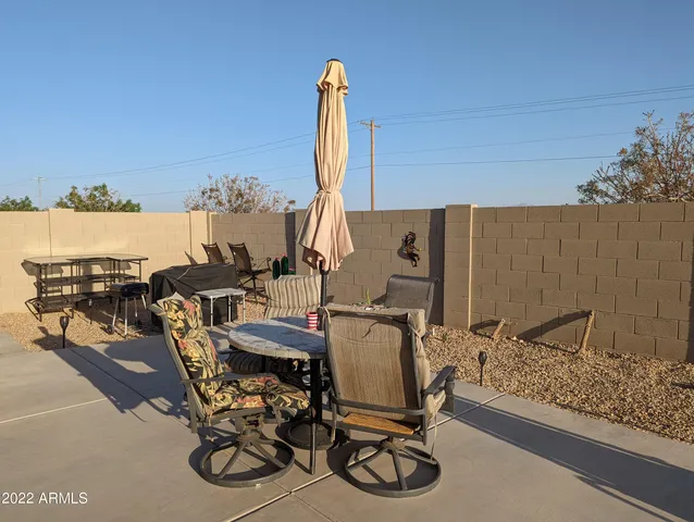 a view of a workspace with furniture