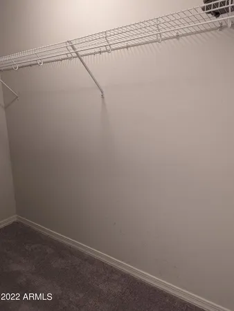 a view of small space with racks on the wall