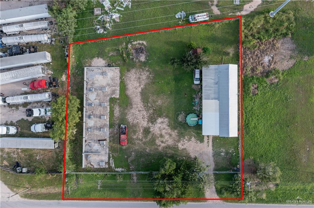 303 Minnesota Road Alamo, TX 78516 - Photo 2 of 4 front view of a house with a yard